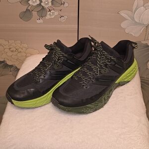 Hoka Black and Green Athletic Shoes